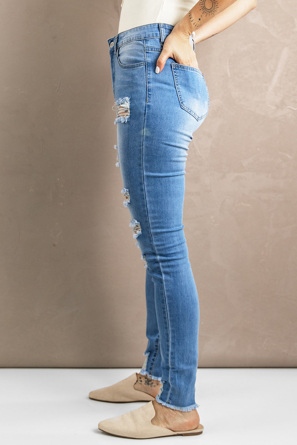 Distressed Raw Hem Skinny Jeans