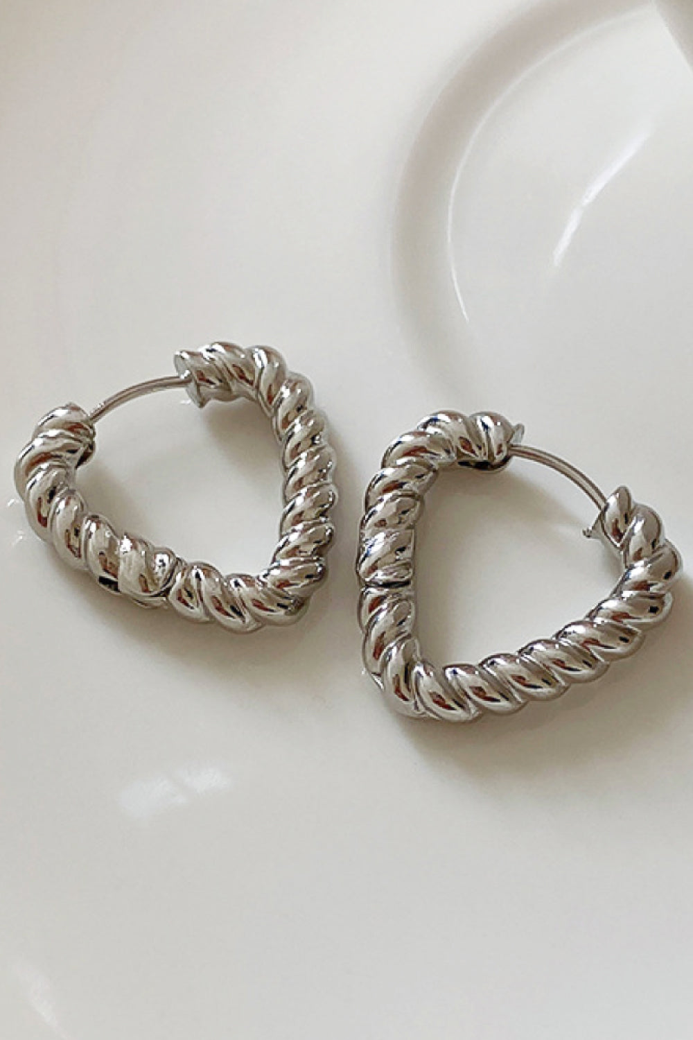 Twisted Triangle Hoop Earrings in Silver