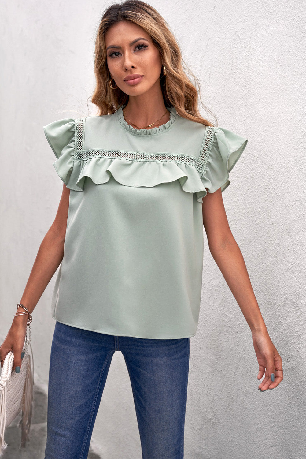 Ruffled Crewneck Sleeveless Blouse