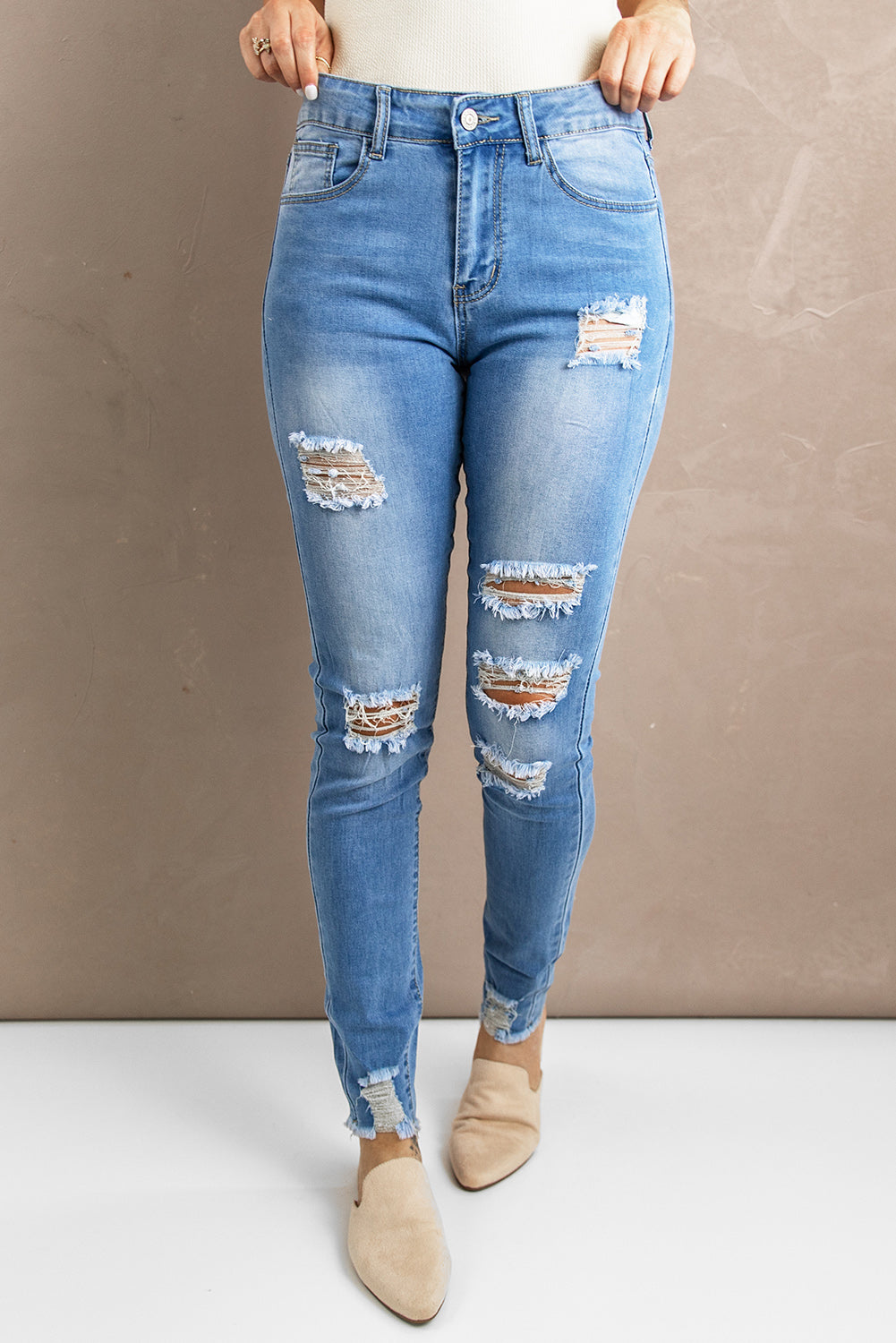 Distressed Raw Hem Skinny Jeans