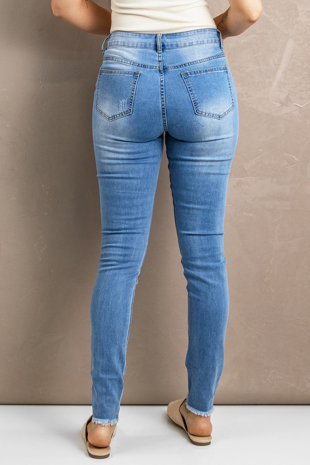 Distressed Raw Hem Skinny Jeans