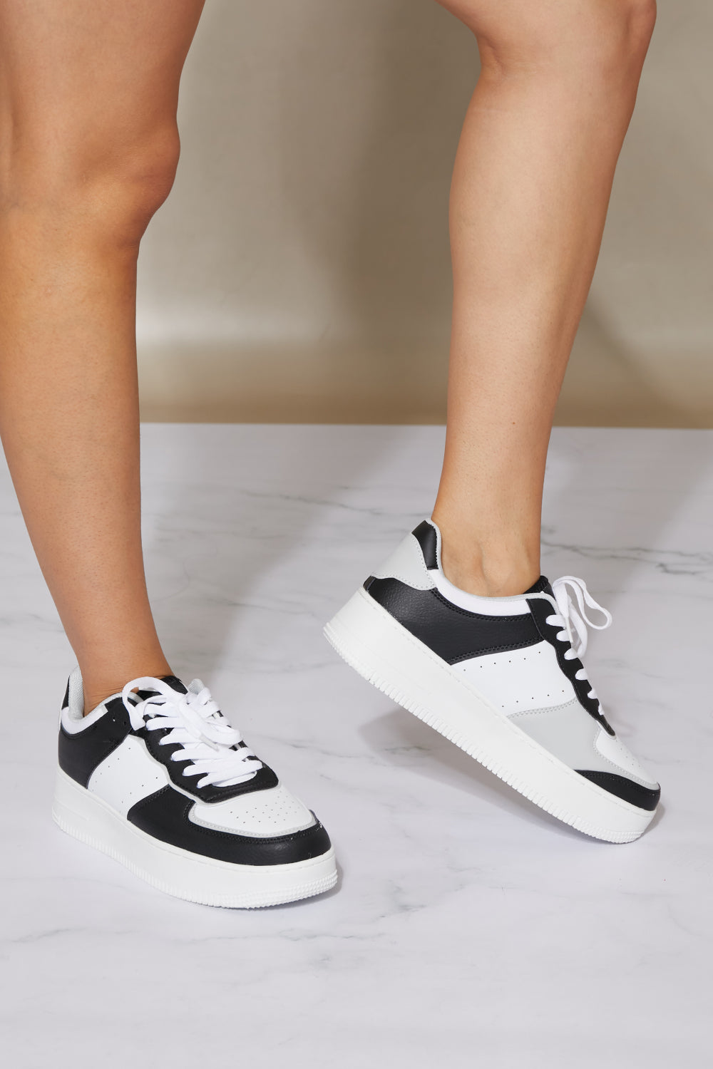 Berness Mile a Minute Platform Sneakers in Black and White