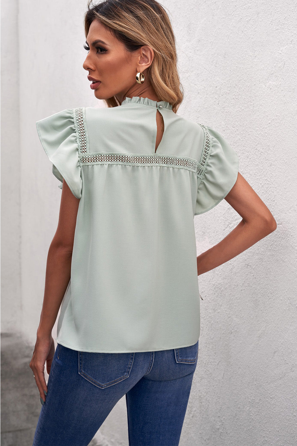 Ruffled Crewneck Sleeveless Blouse